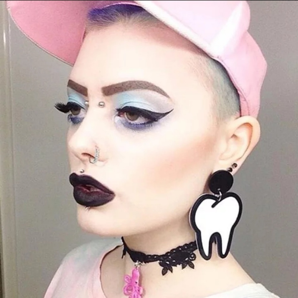 SOLD. Tooth Earrings